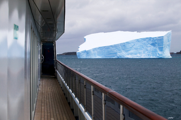  An iceberg visible from the deck of a ship